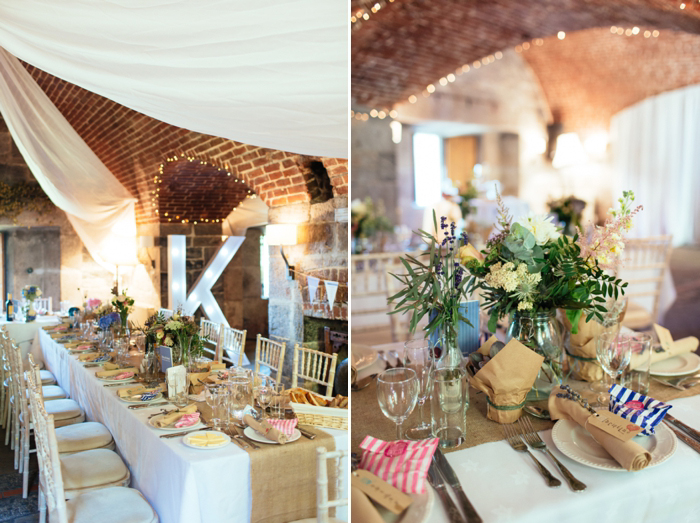 Interior wedding styling at Polhawn Fort with letters from Inspire Hire and flowers form Forbes Field