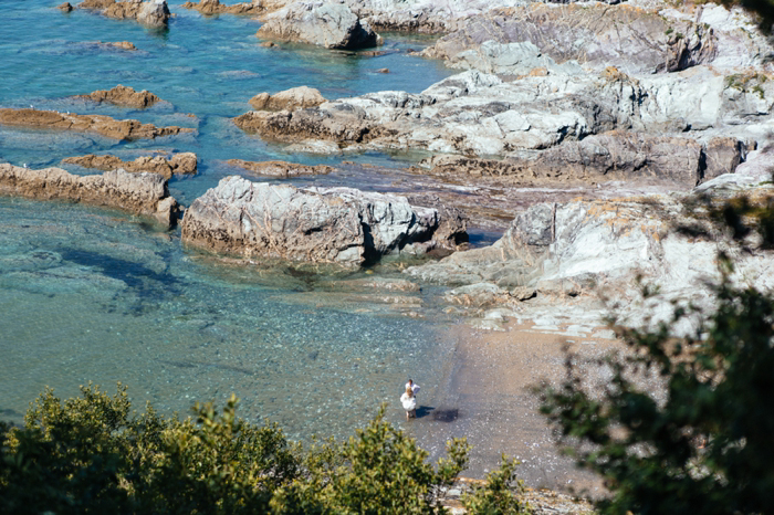 bride and groom on beach